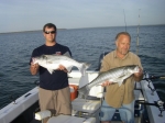 My dad, Bruce, and my cousin, Micah, went out with me and caught these monster stripers on Lake Texoma